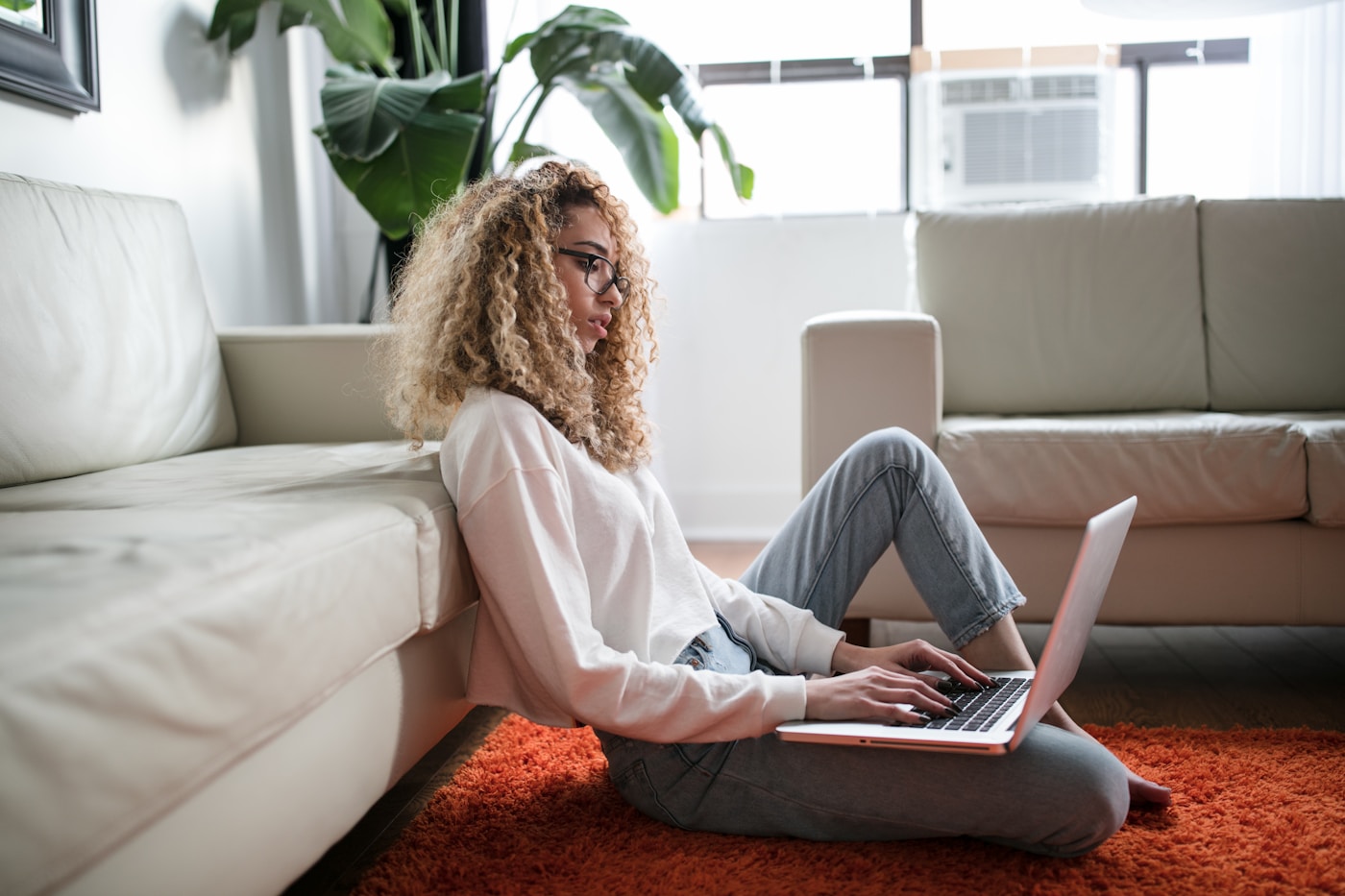 Person enjoying bidding online on a laptop